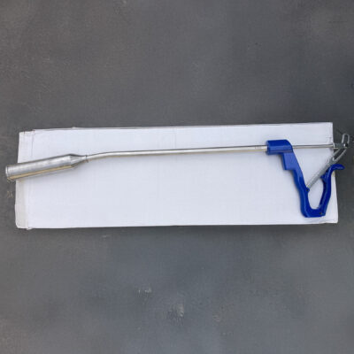 Metal and plastic tool on white box background